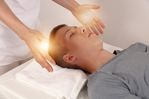 Oasis Wellness Partners - Kid Undergoing Reiki